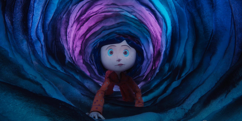 Coraline crawling through a dark tunnel in Coraline