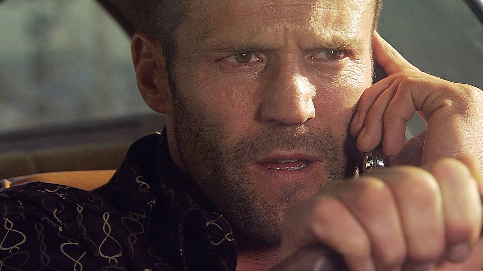 Jason Statham driving while talking on a cellphone as Chev in Crank.