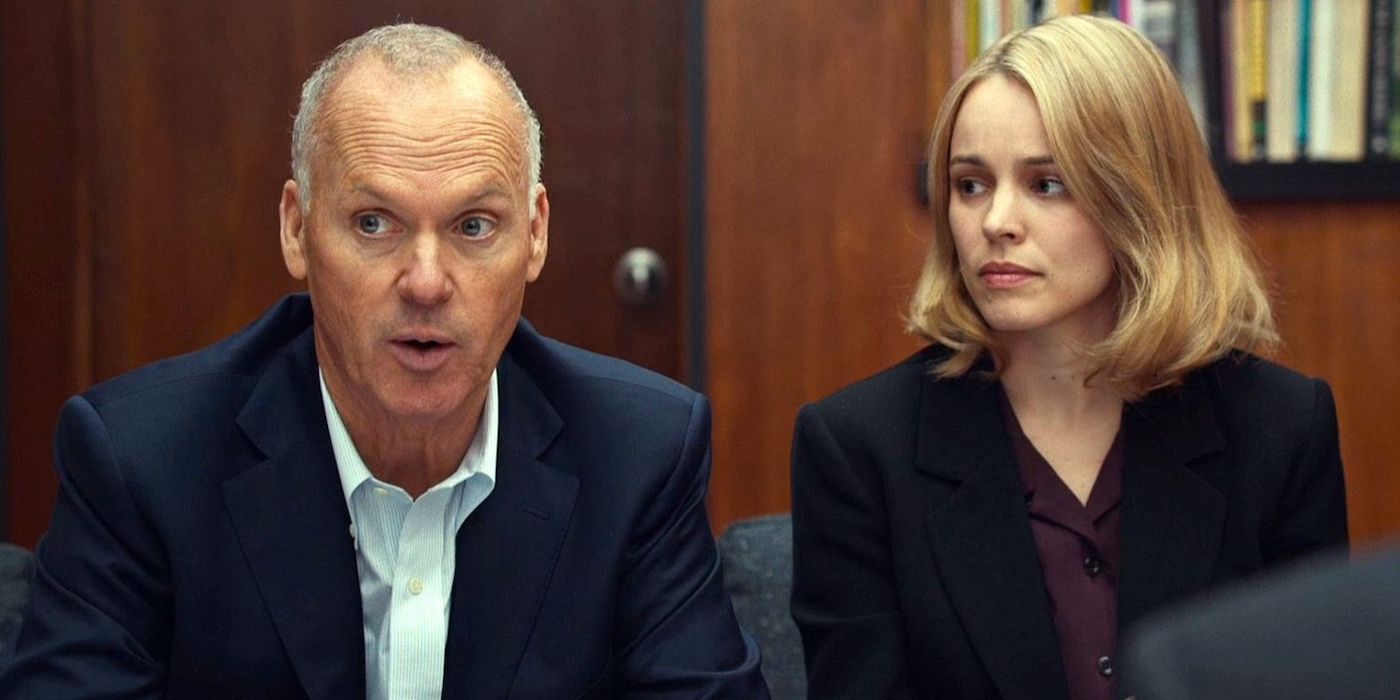 Michael Robinson and Sacha Pfeiffer in a meeting in Spotlight