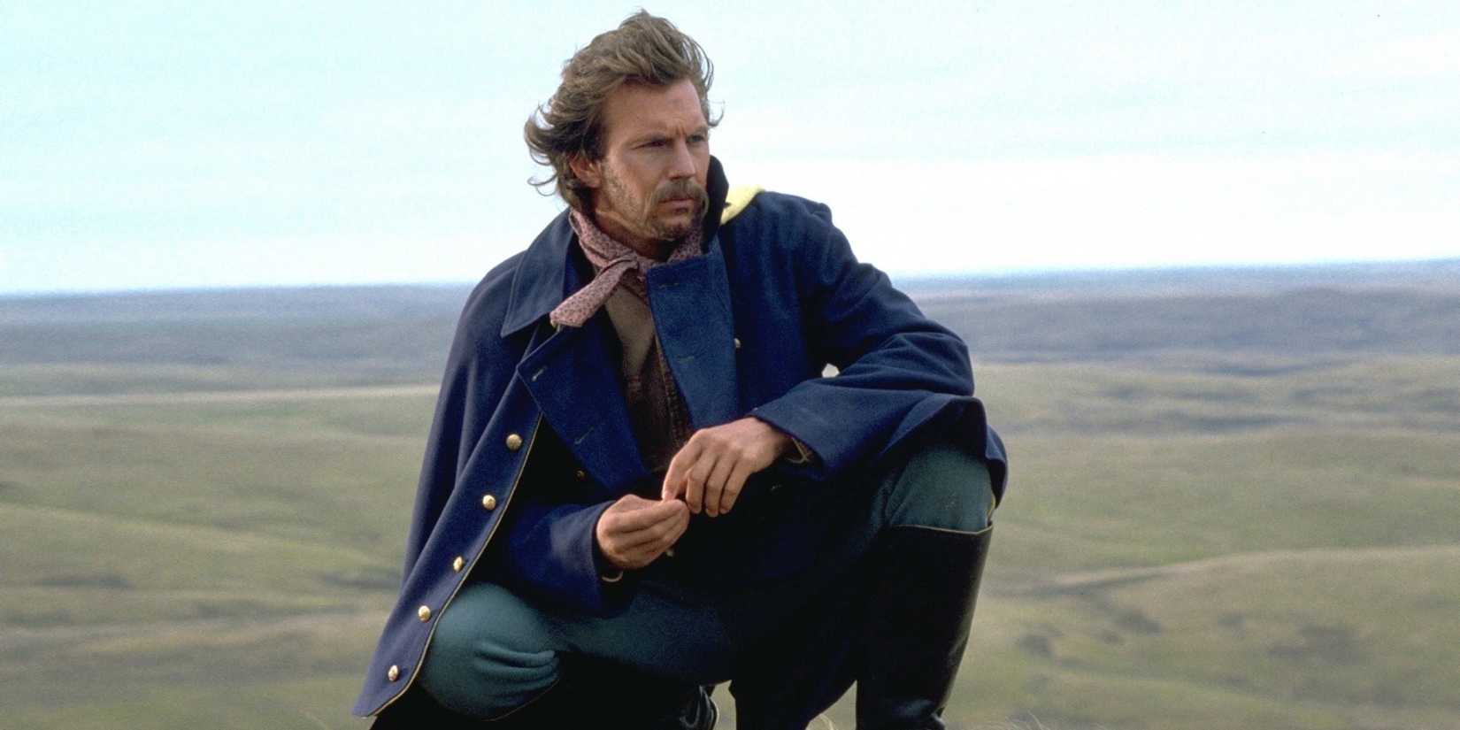 John Dunbar keenling in the desert and looking to the distance in Dances with Wolves.