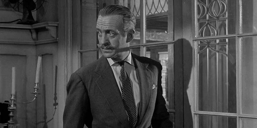 Major David Angus looks back before opening glass door in the film Separate Tables