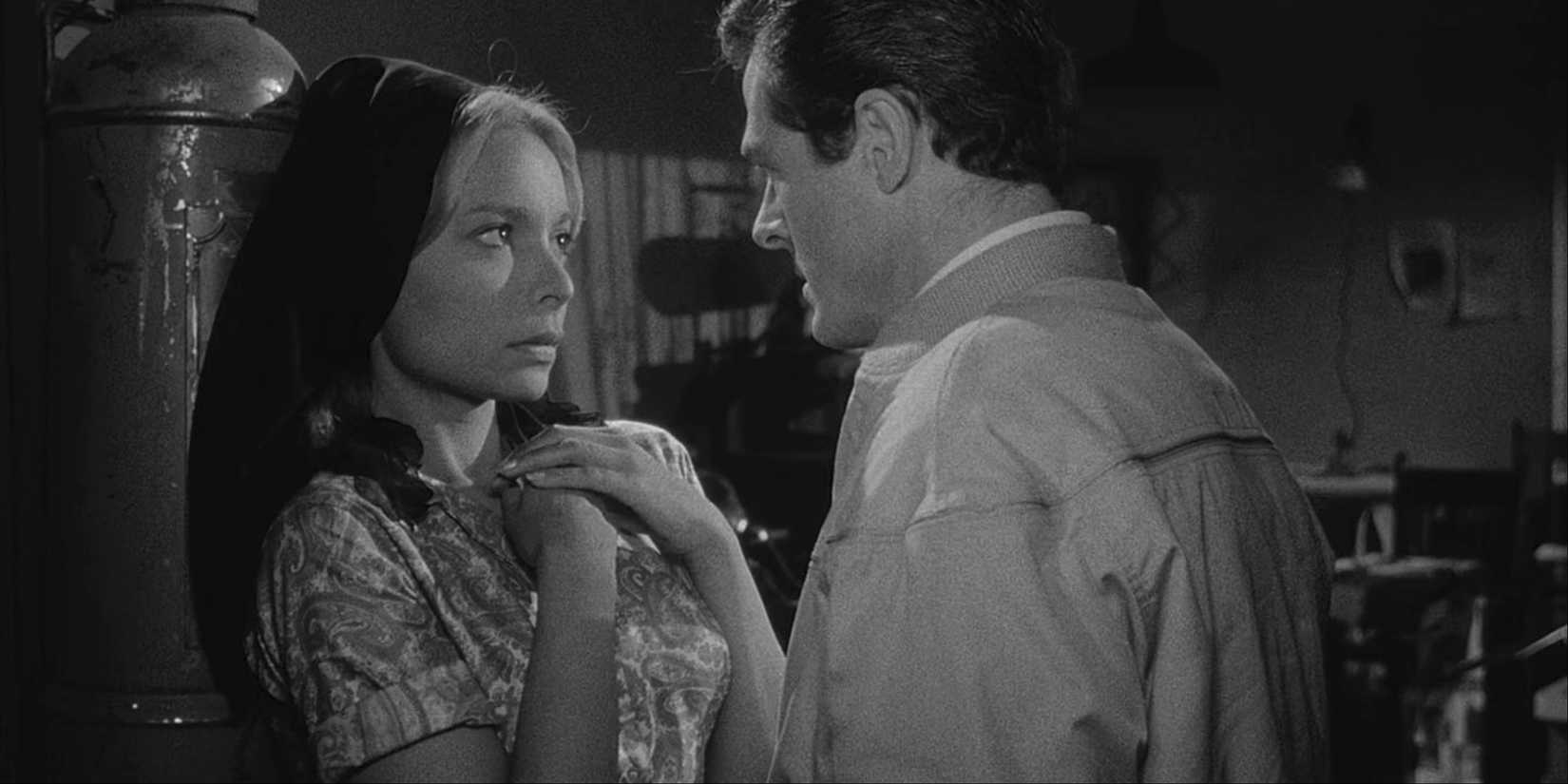 A man and woman talking in The Outer Limits.