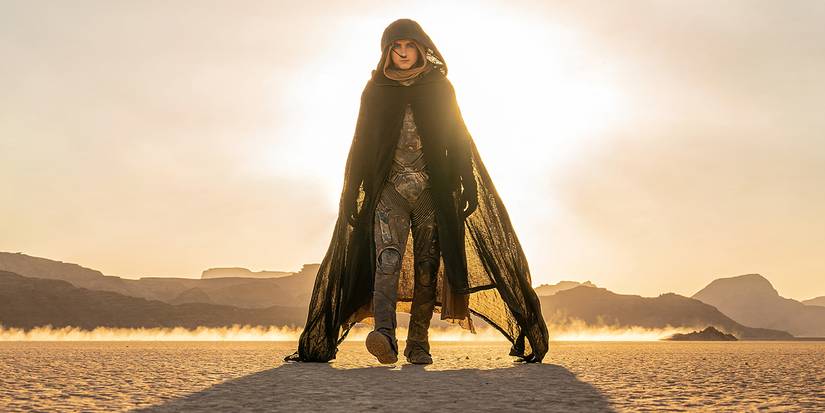 Timothée Chalamet walking through the desert in Dune: Part Two