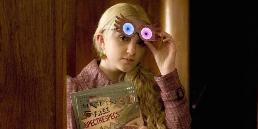Luna Lovegood wearing spectrespecs and holding a quibbler magazine in Harry Potter.