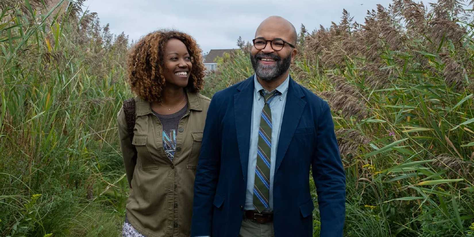 Erika Alexander smiling at Jeffrey Wright in American Fiction.