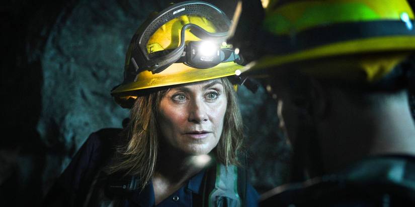 Diane Farr as Sharon Leone in a cave in Fire Country Season 2, Episode 2