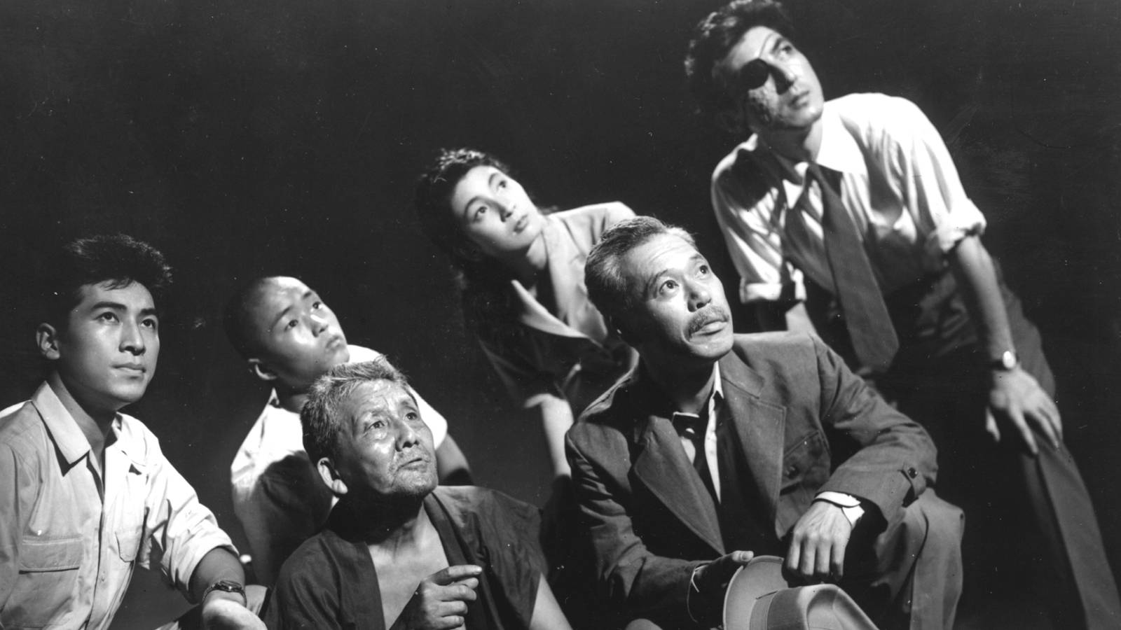 A group of Japanese people looking up in Godzilla - 1954