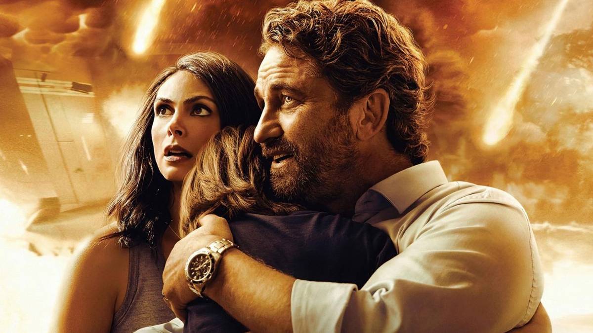 Morena Baccarin and Gerard Butler on the poster for Greenland with orange explosions behind them.