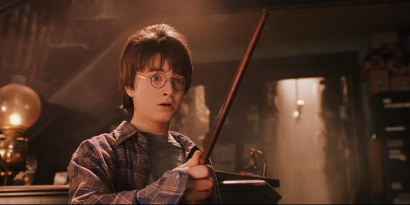Harry Potter (Daniel Radcliffe) getting his wand in 'Harry Potter and the Sorcerer's Stone'.