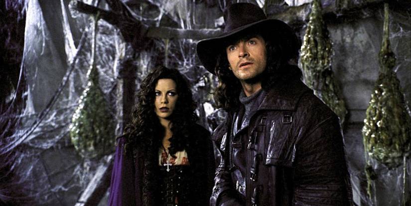 Van Helsing and Anna look confused in a dark cave