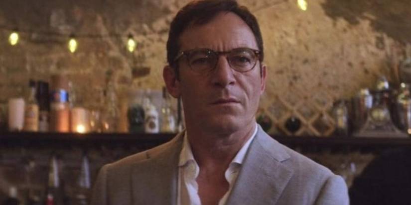 Jason Isaacs wearing glasses in a bar in The OA
