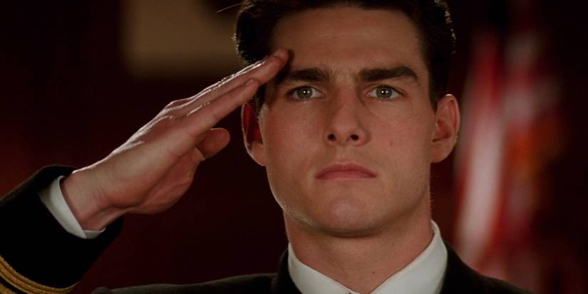 Tom Cruise as Lieutenant Kaffee saluting in uniform in A Few Good Men