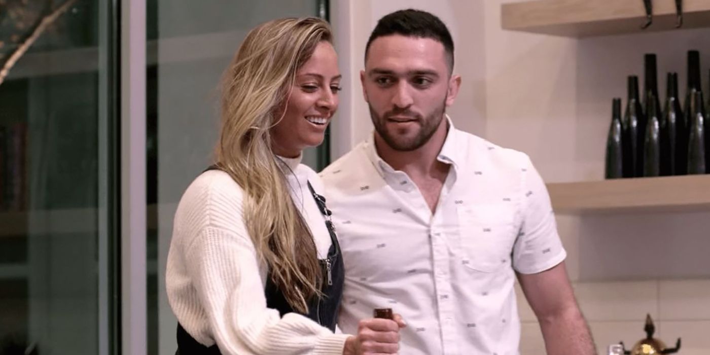 Jessica and Mark from Love is Blind standing in a kitchen together.