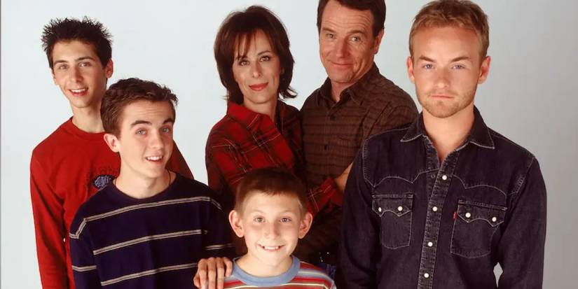 The cast of 'Malcolm in the Middle' looking at the camera with a plain white background.