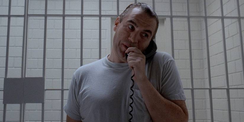 Brian Cox as Hannibal Lecter talking on the phone in his cell in Manhunter