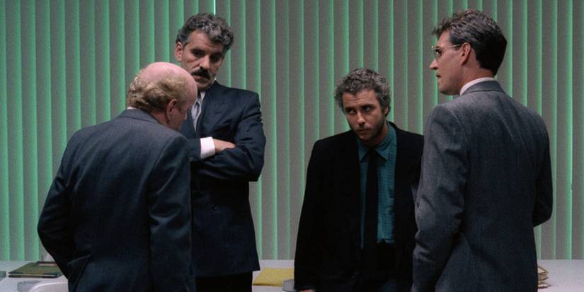 Will Graham standing in group of other FBI men in Manhunter