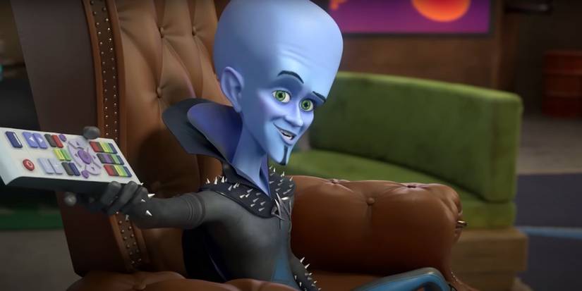 Megamind holding a TV remote in Megamind vs the Doom Syndicate.