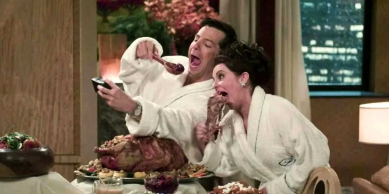 Megan Mullally and Sean Hayes taking a picture of themselves eating turkey in Will & Grace