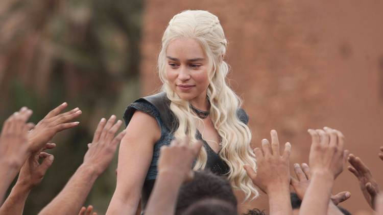 Daenerys Targaryen (Emilia Clarke) is revered as a savior by the freed slaves of Yunkai in Game of Thrones.