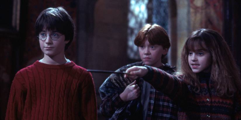 Hermione Granger casts a spell while Harry and Ron watch in 'Harry Potter and the Philosopher's Stone.'