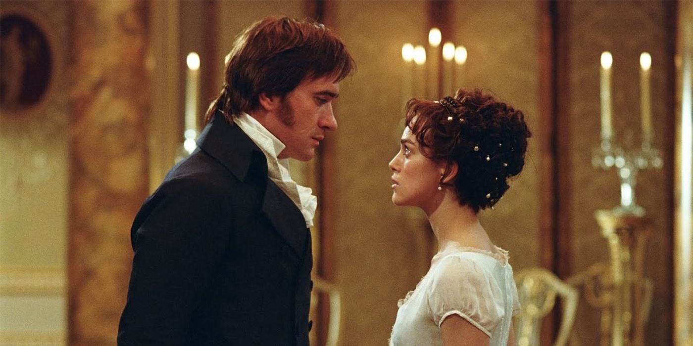 Keira Knightley as Elizabeth Bennet and Matthew Macfadyen as Mr. Darcy dancing in Pride and Prejudice.