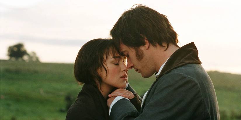 Keira Knightley as Elizabeth holds hands and embraces Matthew Macfadyen as Darcy in Pride and Prejudice.
