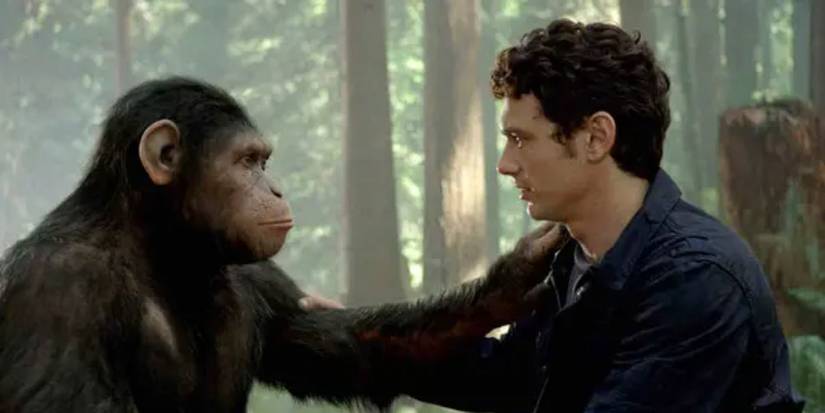 Andy Serkis putting his arm on James Franco's shoulder in Rise of the Planet of the Apes