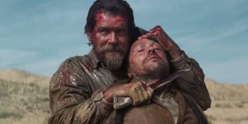 Gideon (Pierce Brosnan) holds his Bowie knife to Hayes (Michael Wincott) in 'Seraphim Falls'