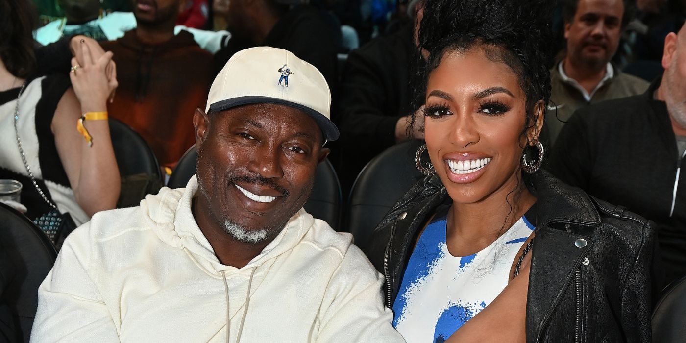 Simon and Porsha Guobadia smile together at an event prior to their divorce