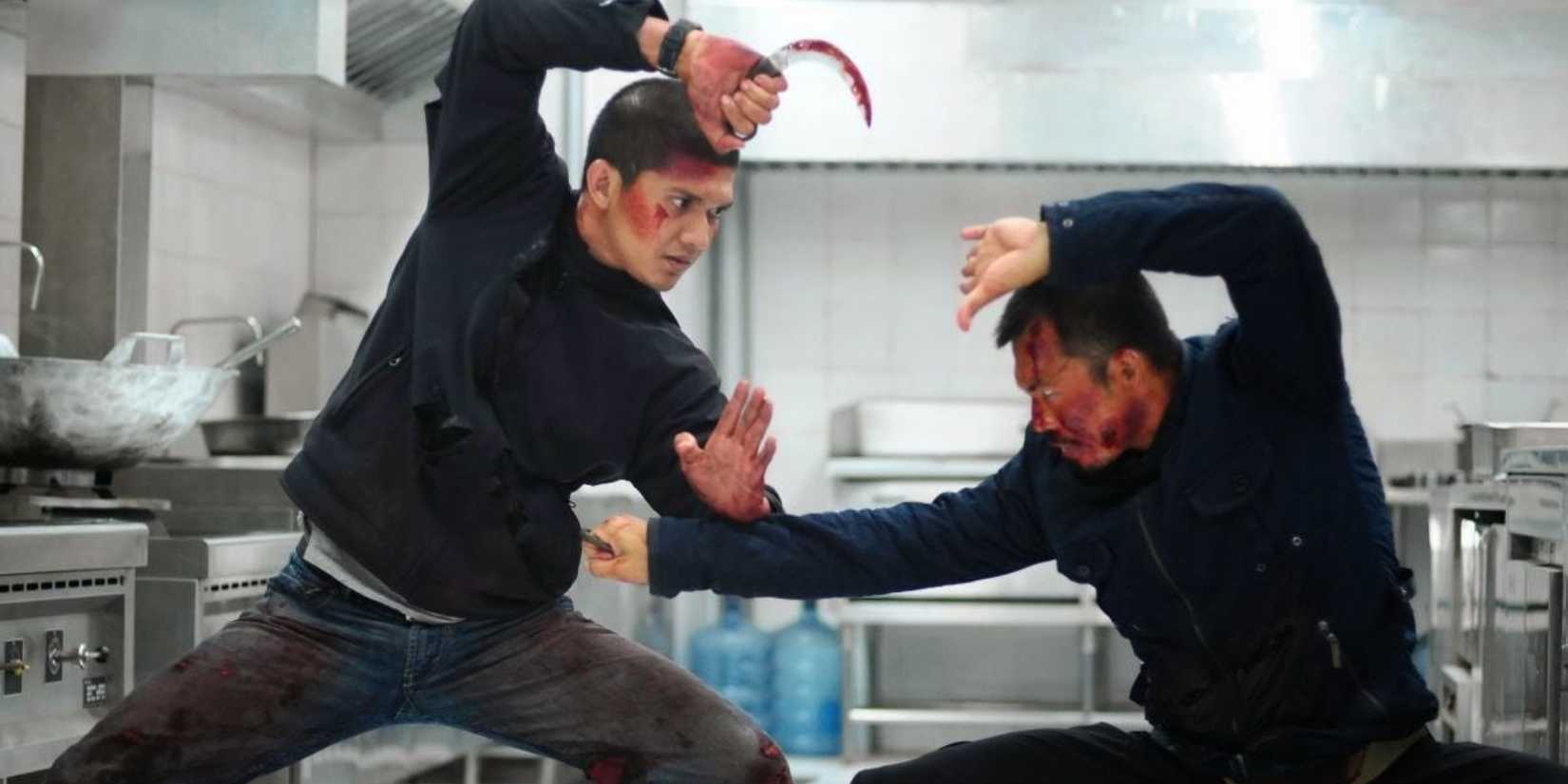 Iko Uwais in a fight in a kitchen in 'The Raid 2'.