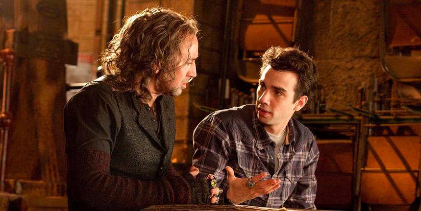 Nicolas Cage as the sorcerer Balthazar Blake mentors his young apprentice David Stutler, played by Jay Baruchel in The Sorcerer's Apprentice