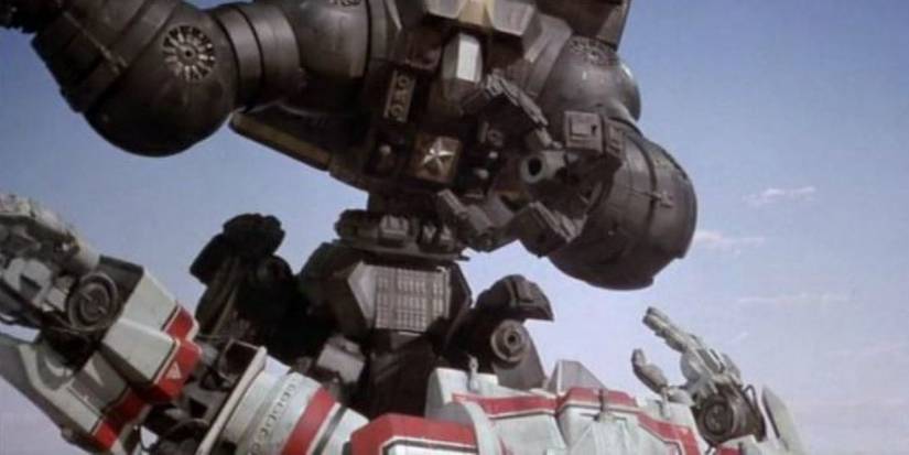 Two mechs fighting hard in Robot Jox