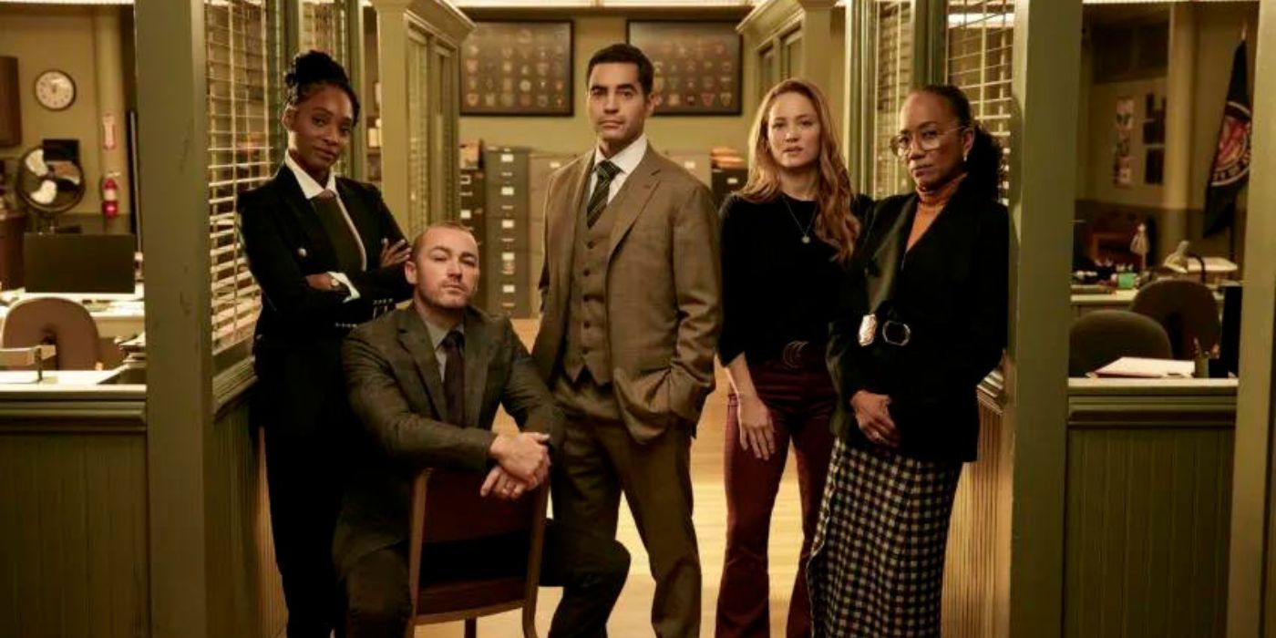 The main cast of Will Trent pose in an office
