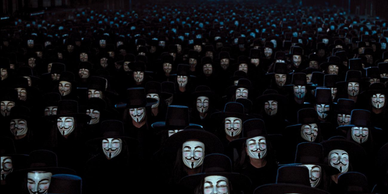 A crowd full of masked men