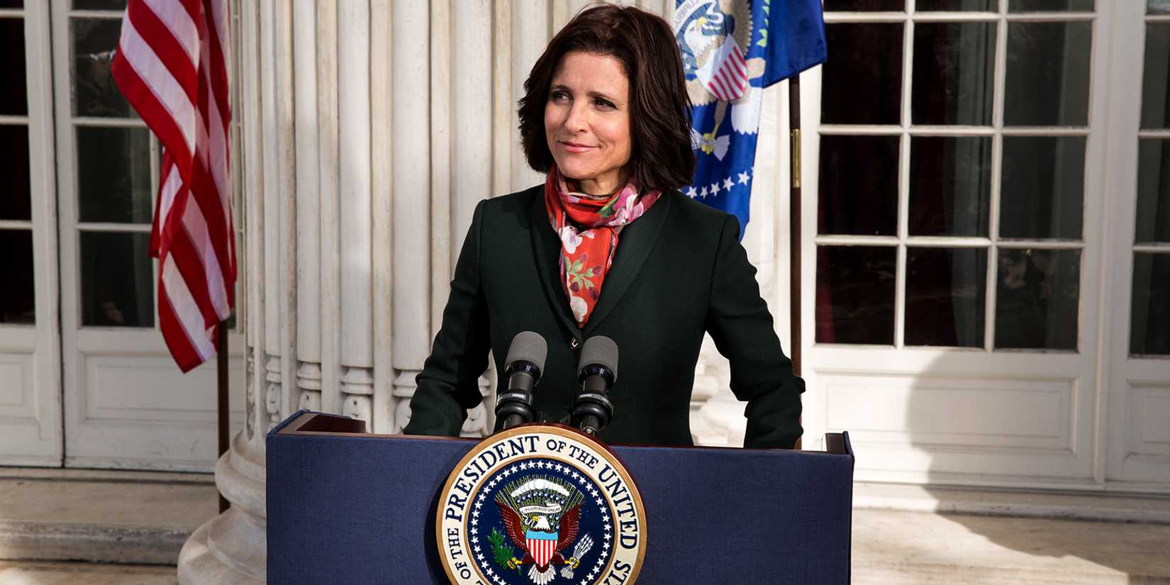 Selina Meyer (Julia Louis-Dreyfus) stands outside the White House in 'Veep'