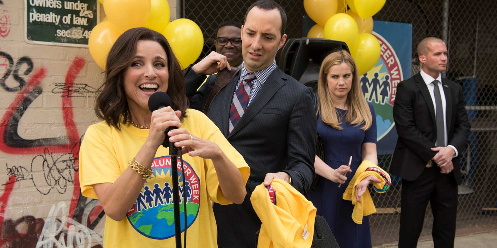Julia Louis Drefyus as Selina Meyer talking into a microphone in Veep