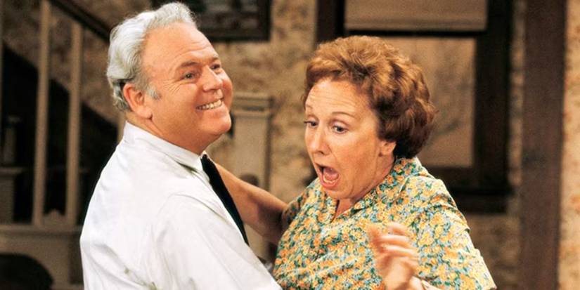 Archie and Edith Bunker embracing in All in the Family.