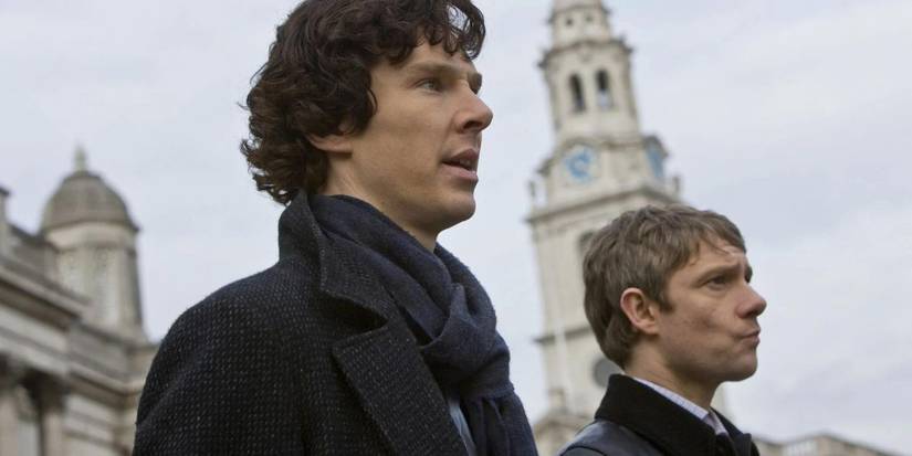 Sherlock and Watson looking ahead with the skyline behind them in Sherlock Season 1