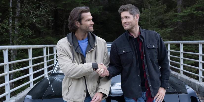 Sam and Dean Winchester shake hands after being reunited in Heaven in the 'Supernatural' series finale.