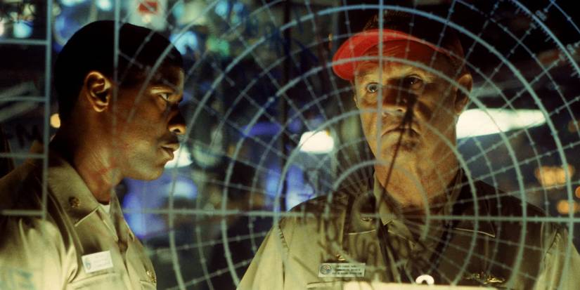 Denzel Washington and Gene Hackman discuss potential combat strategy on board a submarine in Tony Scott's 'Crimson Tide'