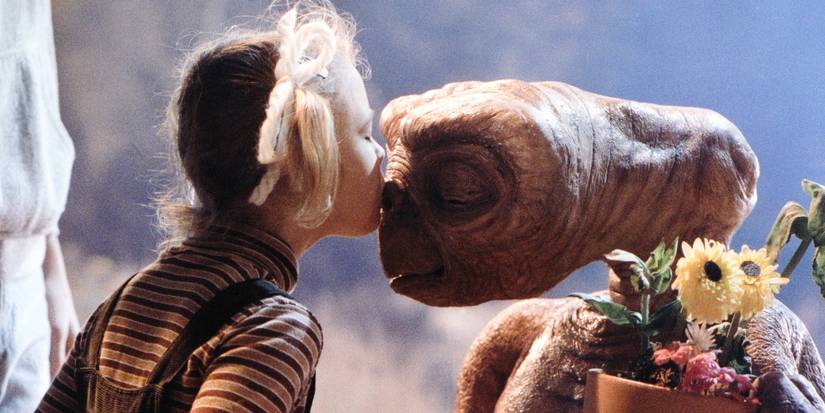 Drew Barrymore kissing E.T. on the nose in E.T. 