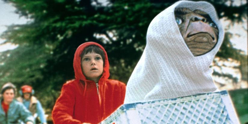 Elliott, played by Henry Thomas, bikes with E.T. in his bicycle basket in 'E.T. the Extra-Terrestrial'.