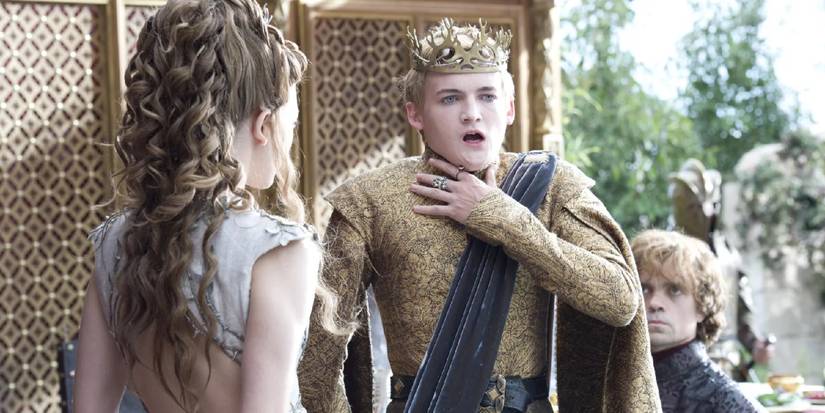 King Joffrey begins choking at his wedding as Lady Margery and Tyrion Lannister look on in Game of Thrones.