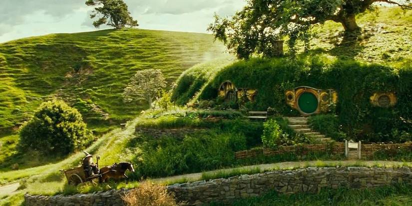 Gandalf rides his cart uphill towards bag end in The Fellowship of the Ring