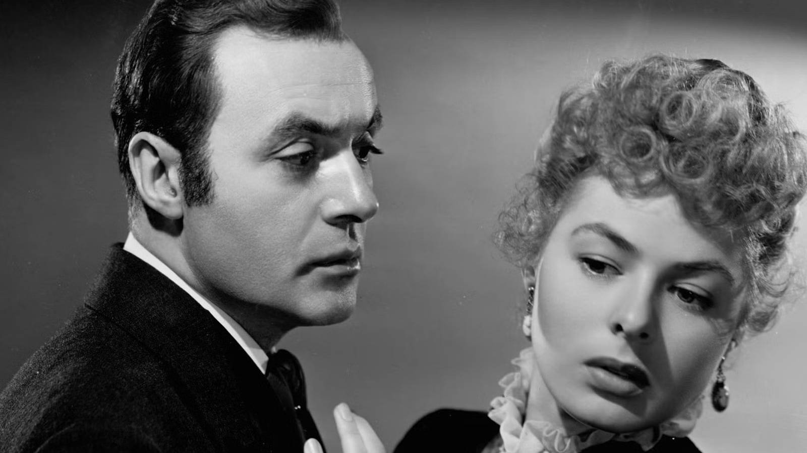 Ingrid Bergman as Paula pulling away from Charles Boyer as Gregory in Gaslight.