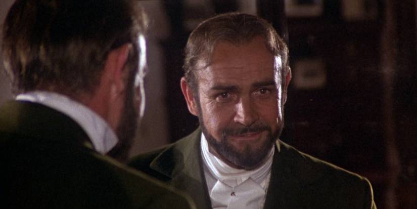 John Simms talking to another man in The Great Train Robbery
