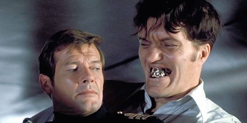 Jaws, played by Richard Kiel, holds James Bond, played by Sir Roger Moore, in 'Moonraker'.
