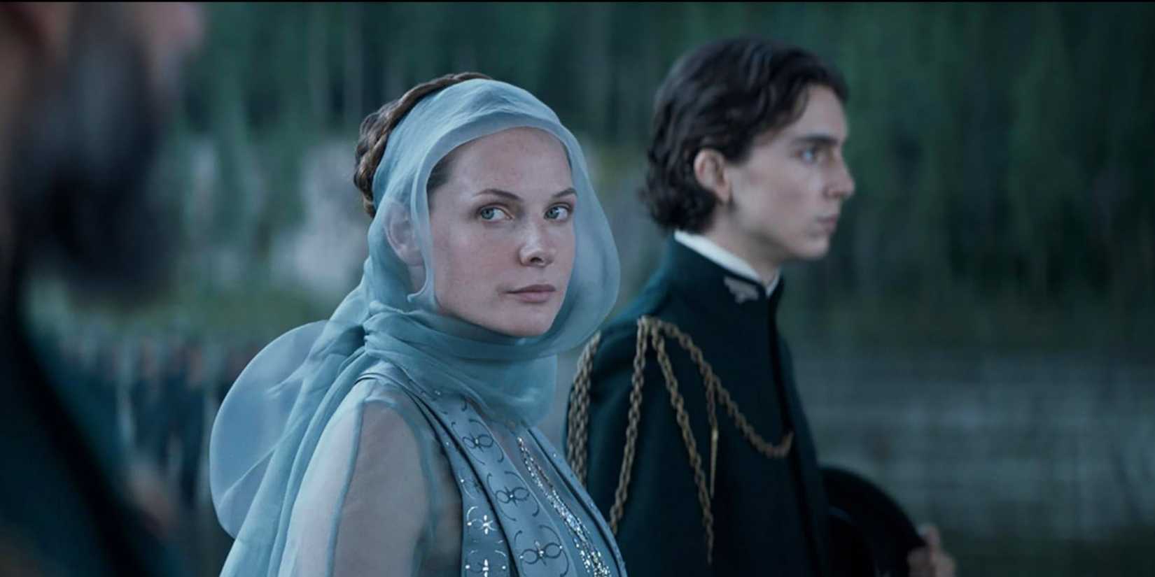 Lady Jessica Altreides (Rebecca Ferguson) walking alongside Paul Altreides Dune (2021)