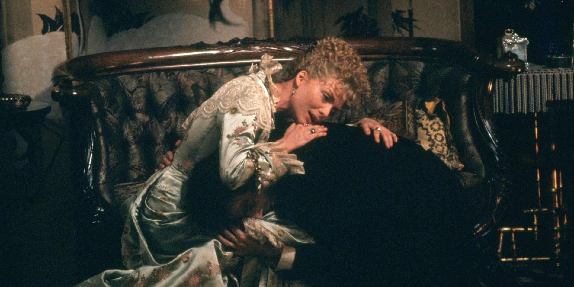 Daniel Day-Lewis crying in Michelle Pfeiffer's lap in The Age of Innocence.