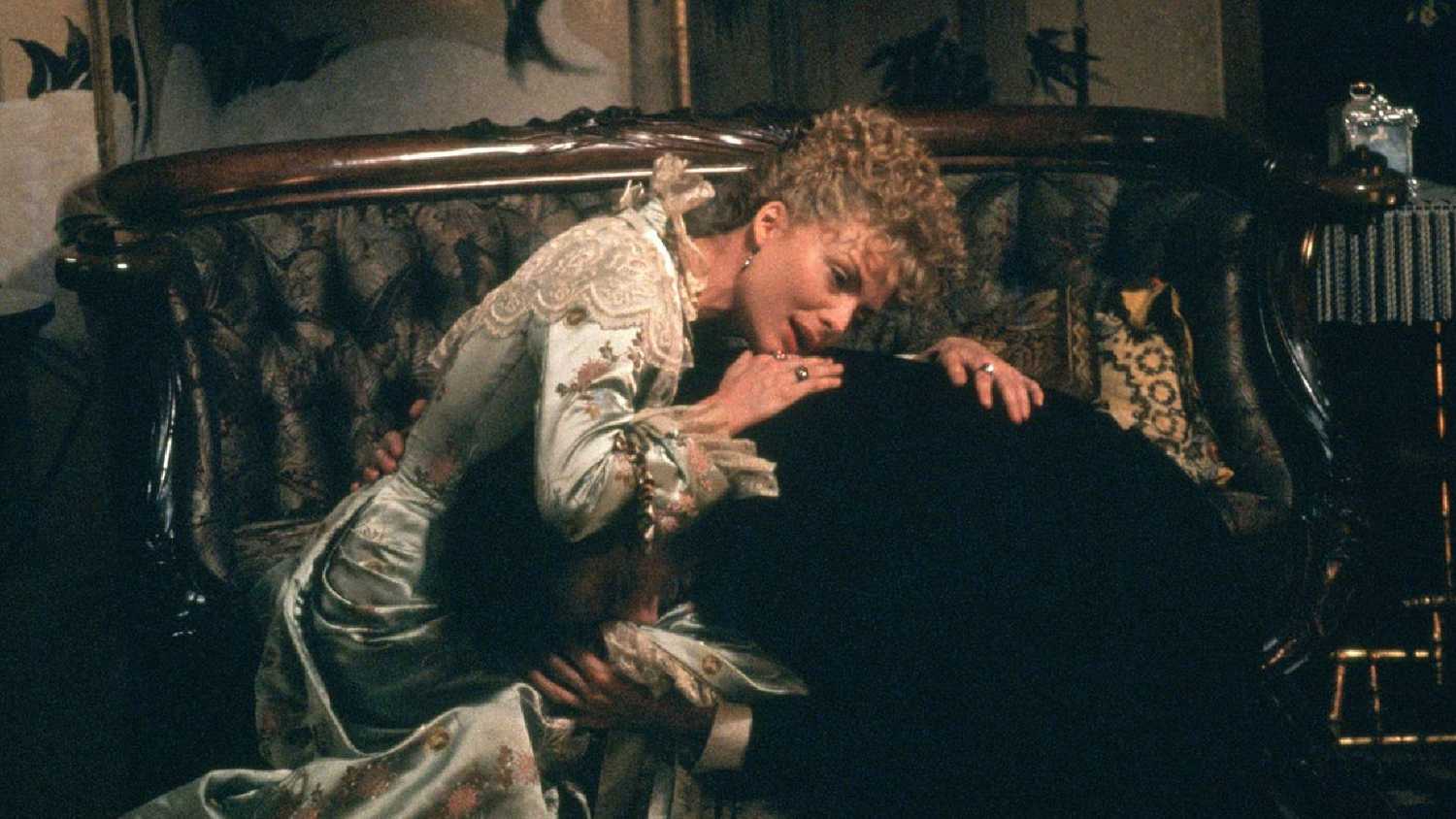 Daniel Day-Lewis crying in Michelle Pfeiffer's lap in The Age of Innocence.